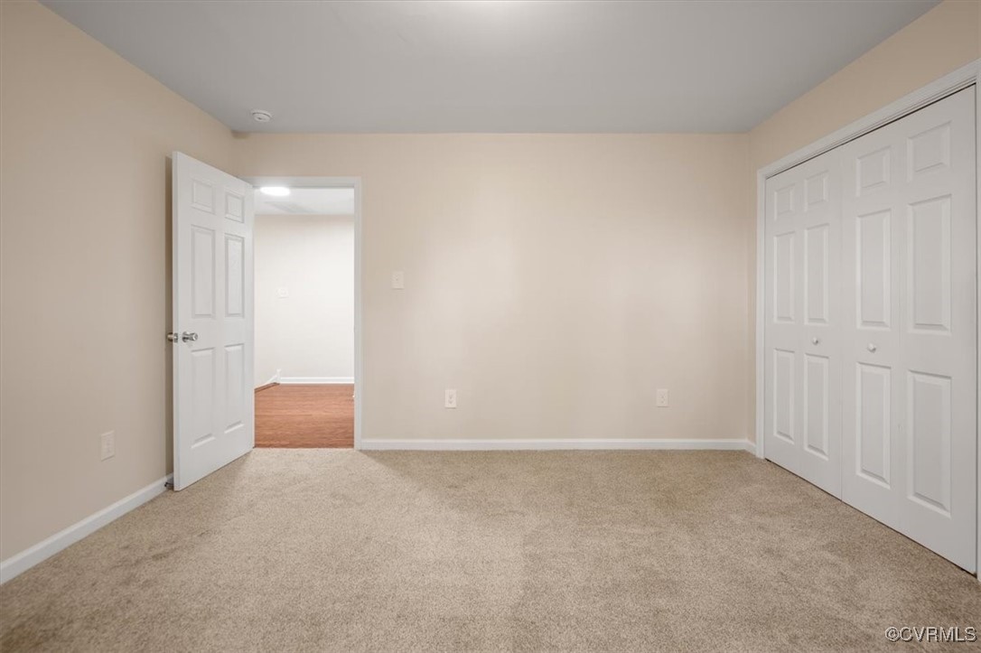 2919 Hog Back Road Hopewell, VA 23860 - Photo 31 of 45 Unfurnished bedroom featuring carpet floors, baseb