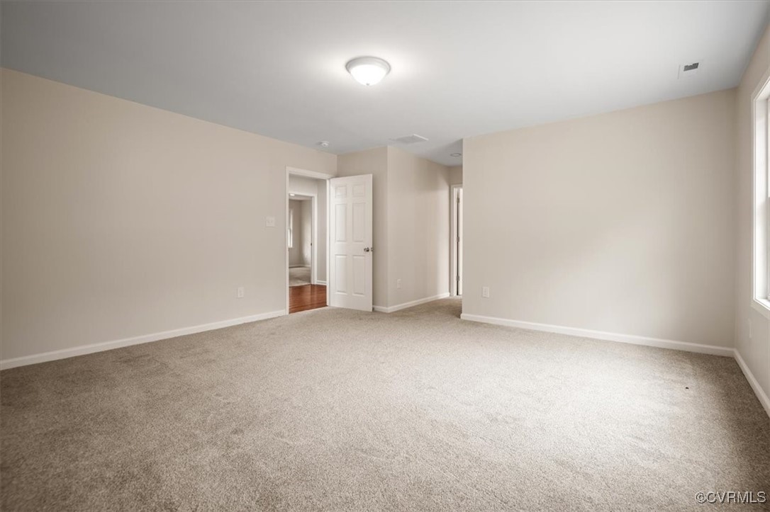 2919 Hog Back Road Hopewell, VA 23860 - Photo 36 of 45 Spare room featuring baseboards and carpet floors