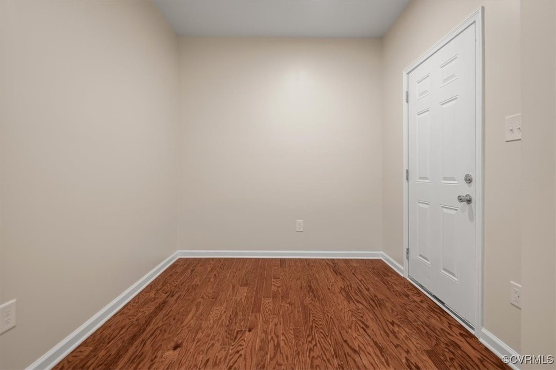 2919 Hog Back Road Hopewell, VA 23860 - Photo 6 of 45 Empty room featuring dark wood-type flooring and b