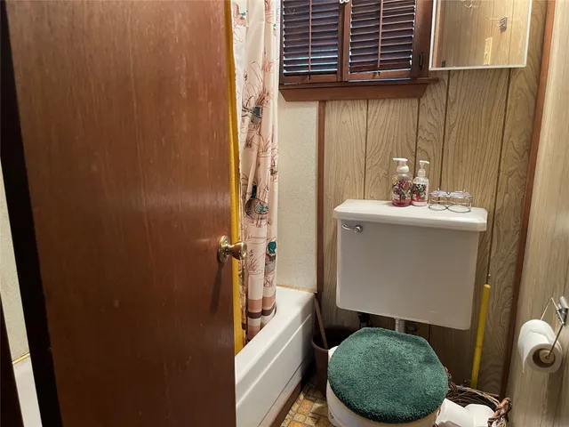 a kitchen with a refrigerator and a stove