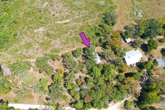 a backyard of a house with swimming pool