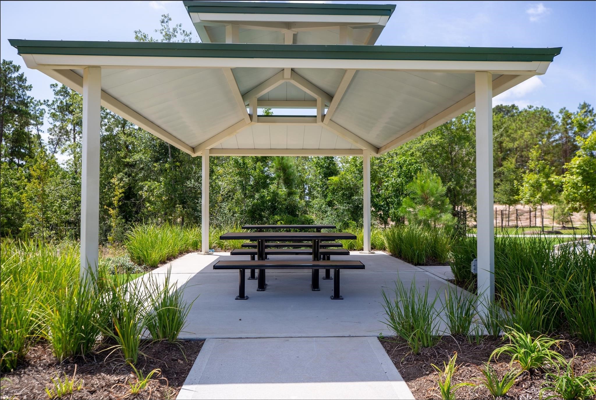 506 Moose Run Huntsville, TX 77320 - Photo 23 of 26 a garden view with a seating space