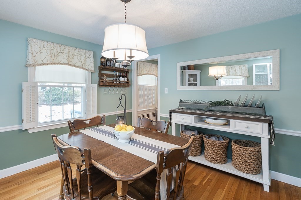 97 Bridle Path Road Springfield, MA 01118 - Photo 12 of 42 a view of a dining room with furniture window and wooden floor