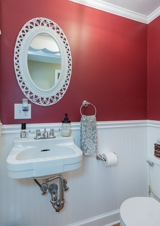 97 Bridle Path Road Springfield, MA 01118 - Photo 21 of 42 a bathroom with a sink mirror vanity and toilet