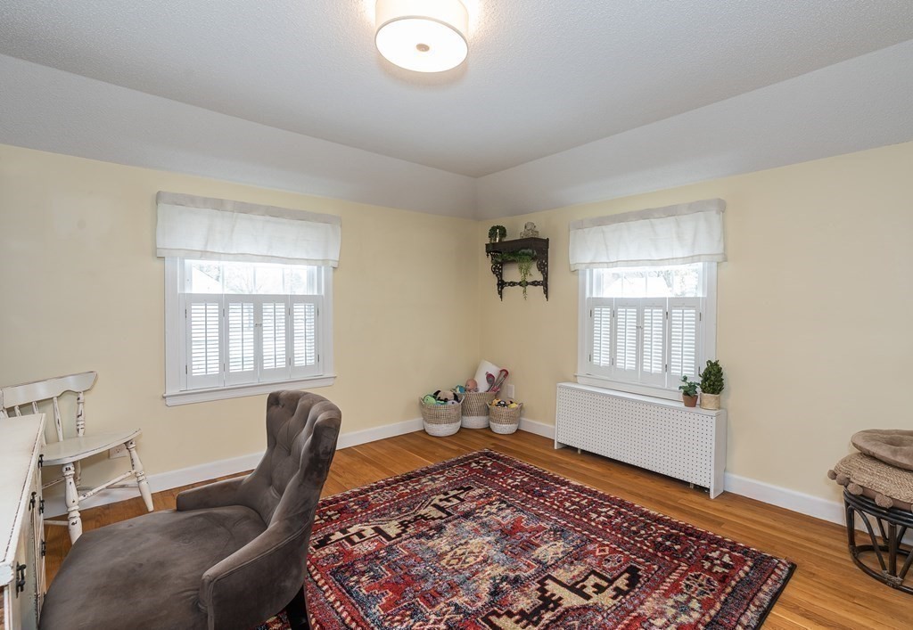 97 Bridle Path Road Springfield, MA 01118 - Photo 30 of 42 a living room with furniture rug and window