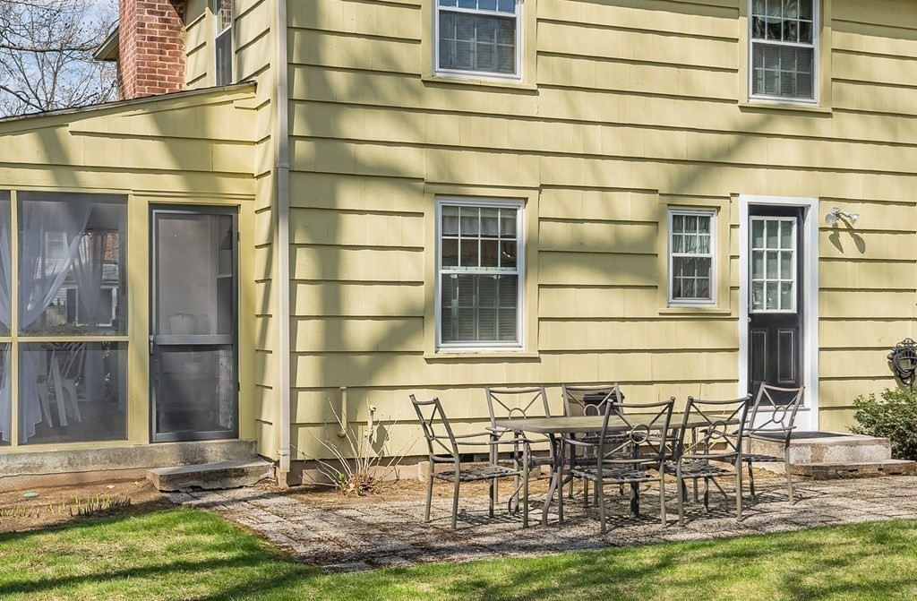 97 Bridle Path Road Springfield, MA 01118 - Photo 36 of 42 a couple of table and chairs in front of house