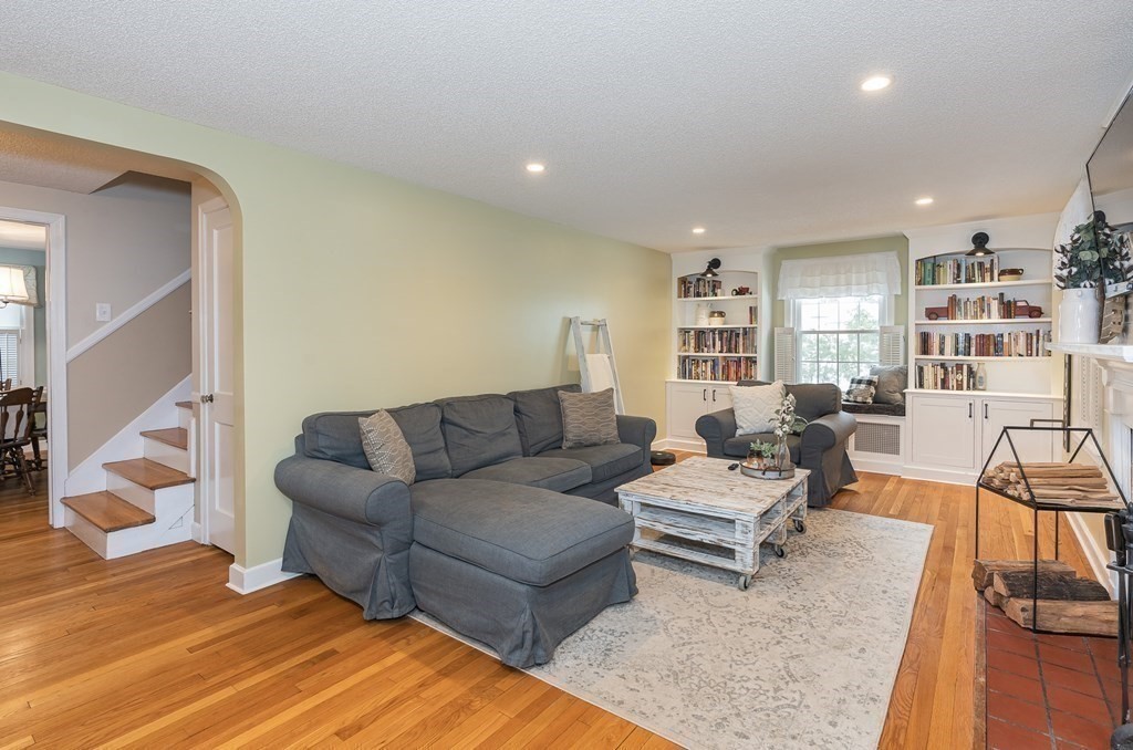 97 Bridle Path Road Springfield, MA 01118 - Photo 5 of 42 a living room with furniture and a wooden floor