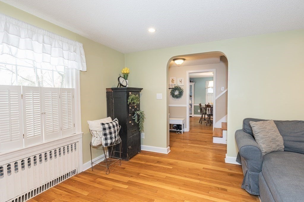 97 Bridle Path Road Springfield, MA 01118 - Photo 9 of 42 a view of a livingroom with furniture and wooden floor