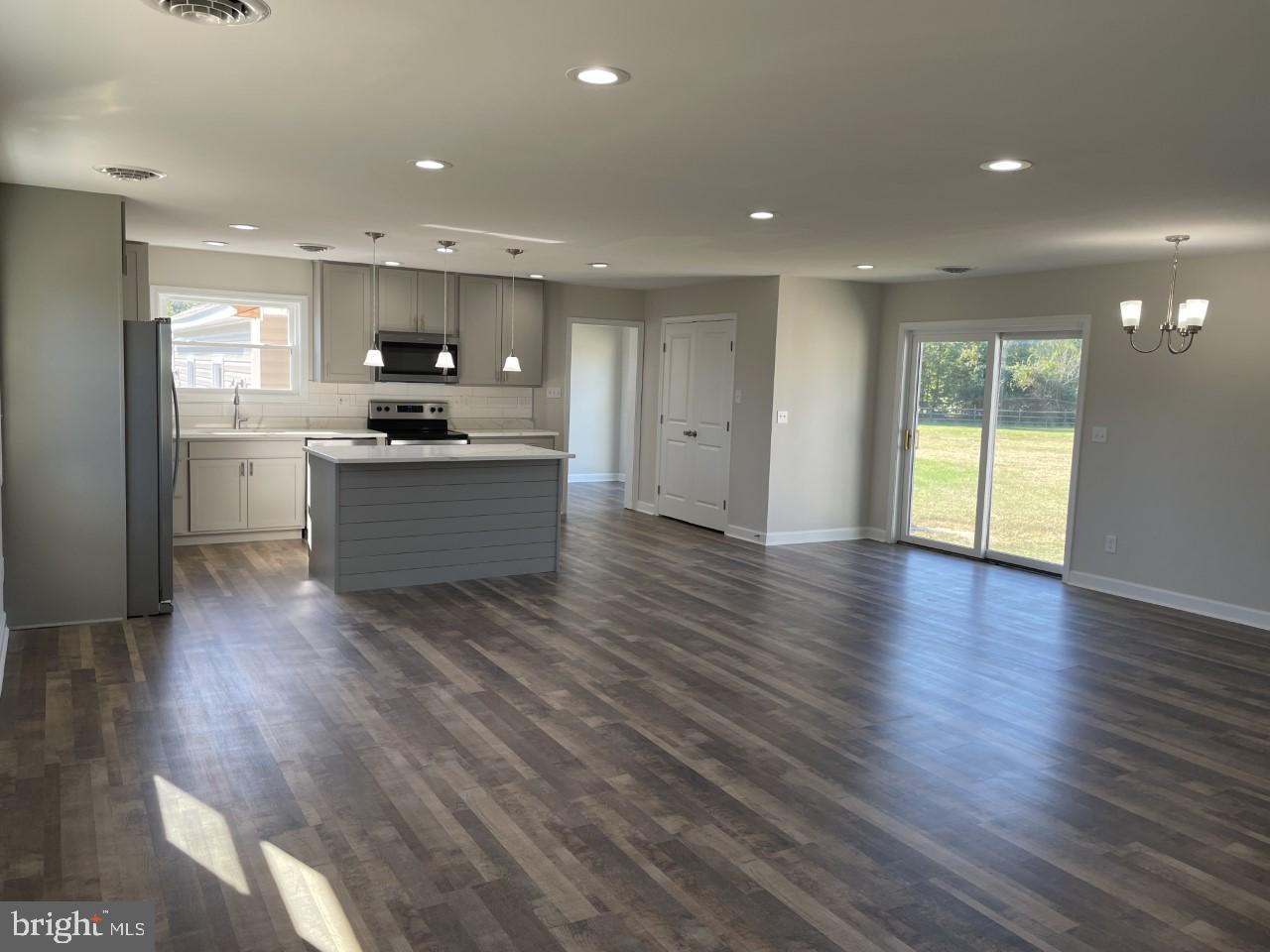 1213 Old Love Point Road Stevensville, MD 21666 - Photo 5 of 31 Living Room/Kitchen