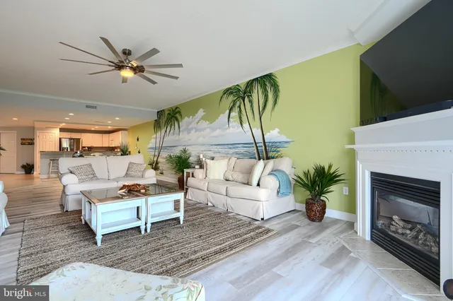 a bedroom with a bed and a flat tv screen next to a window