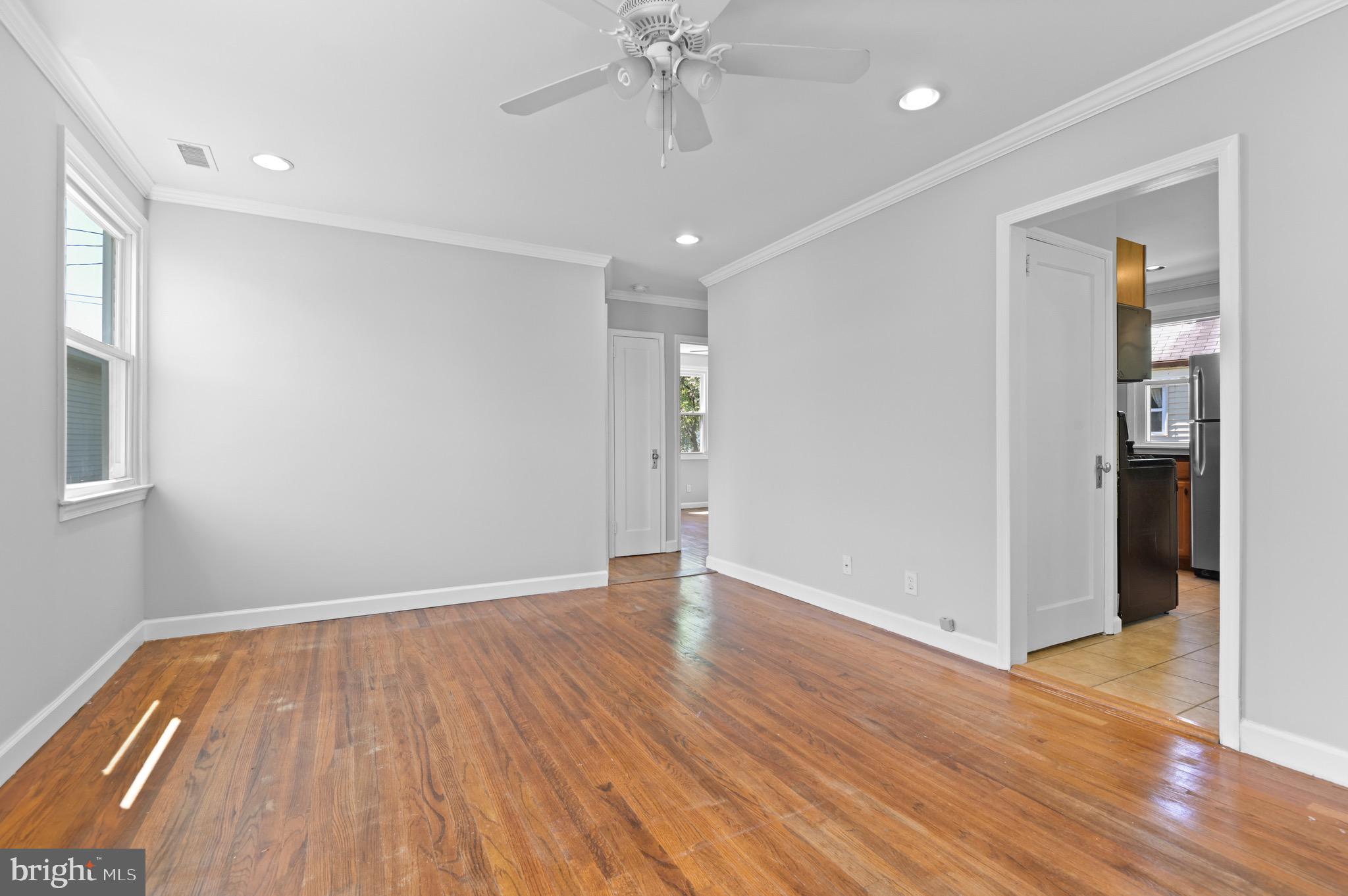 8111 Bullneck Road Baltimore, MD 21222 - Photo 3 of 26 Living room opens to kitchen