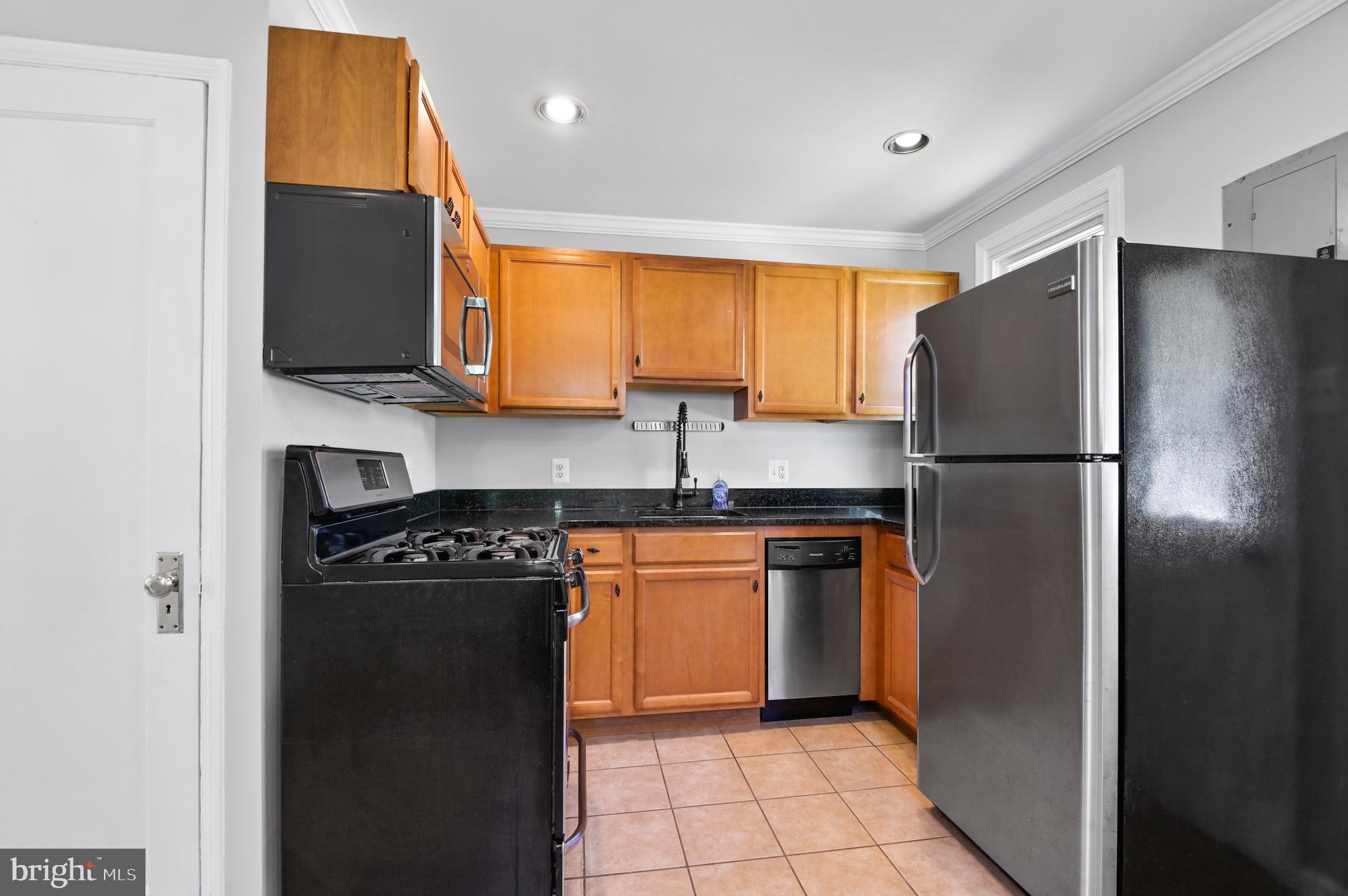 8111 Bullneck Road Baltimore, MD 21222 - Photo 4 of 26 Updated kitchen with SS appliances