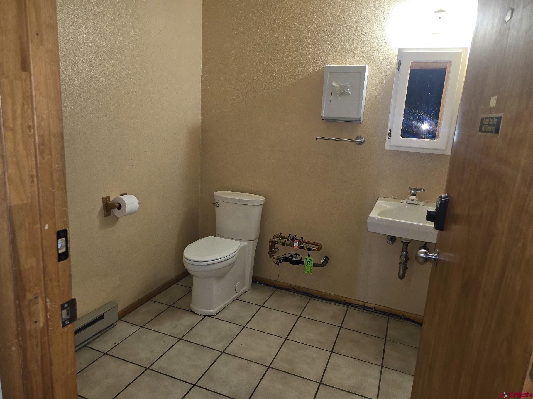 570 Turner (unit A ) Drive, Unit A Durango, CO 81303 - Photo 14 of 23 a bathroom with a toilet and a sink