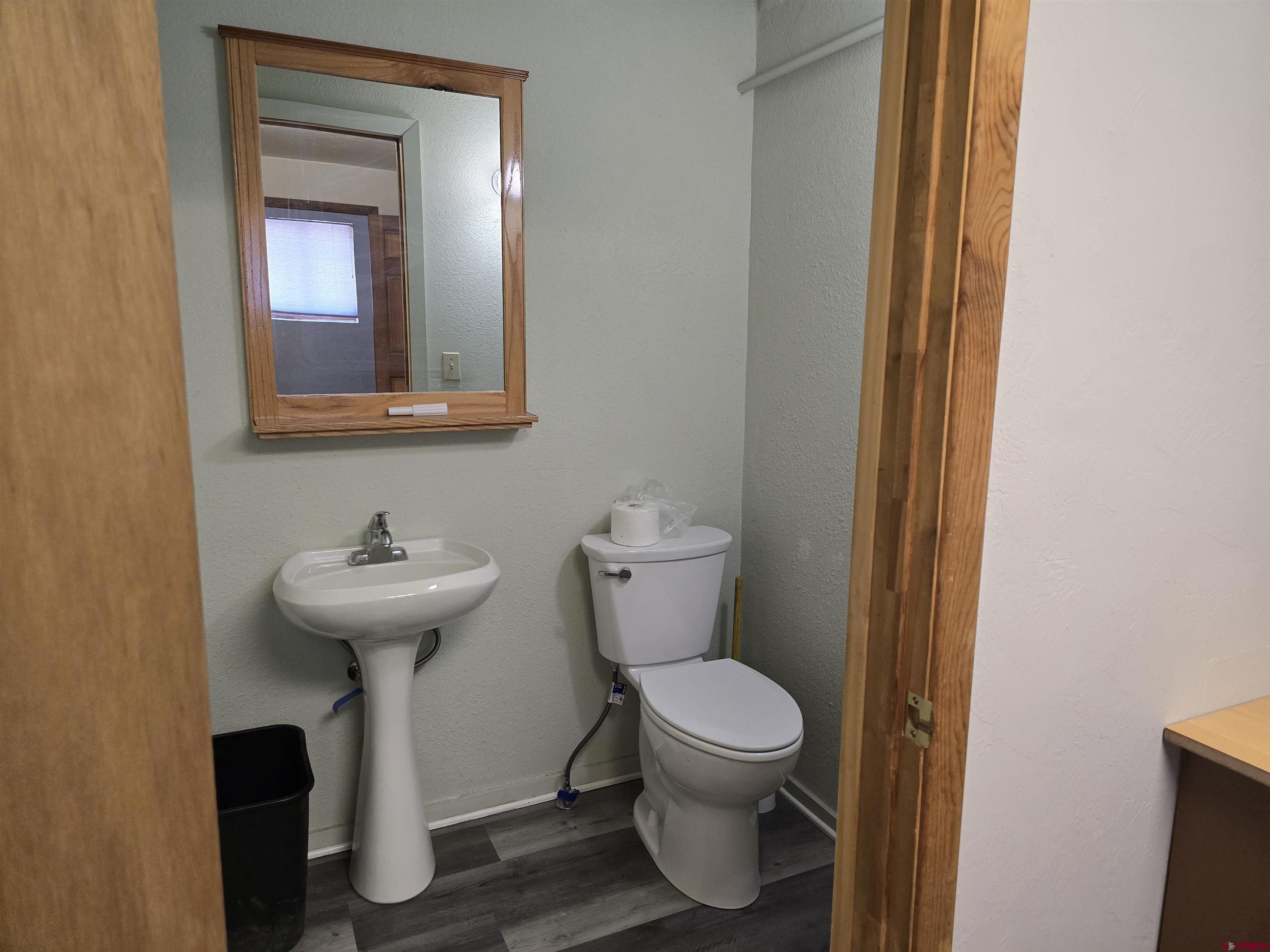 570 Turner (unit A ) Drive, Unit A Durango, CO 81303 - Photo 15 of 23 a bathroom with a toilet sink and mirror