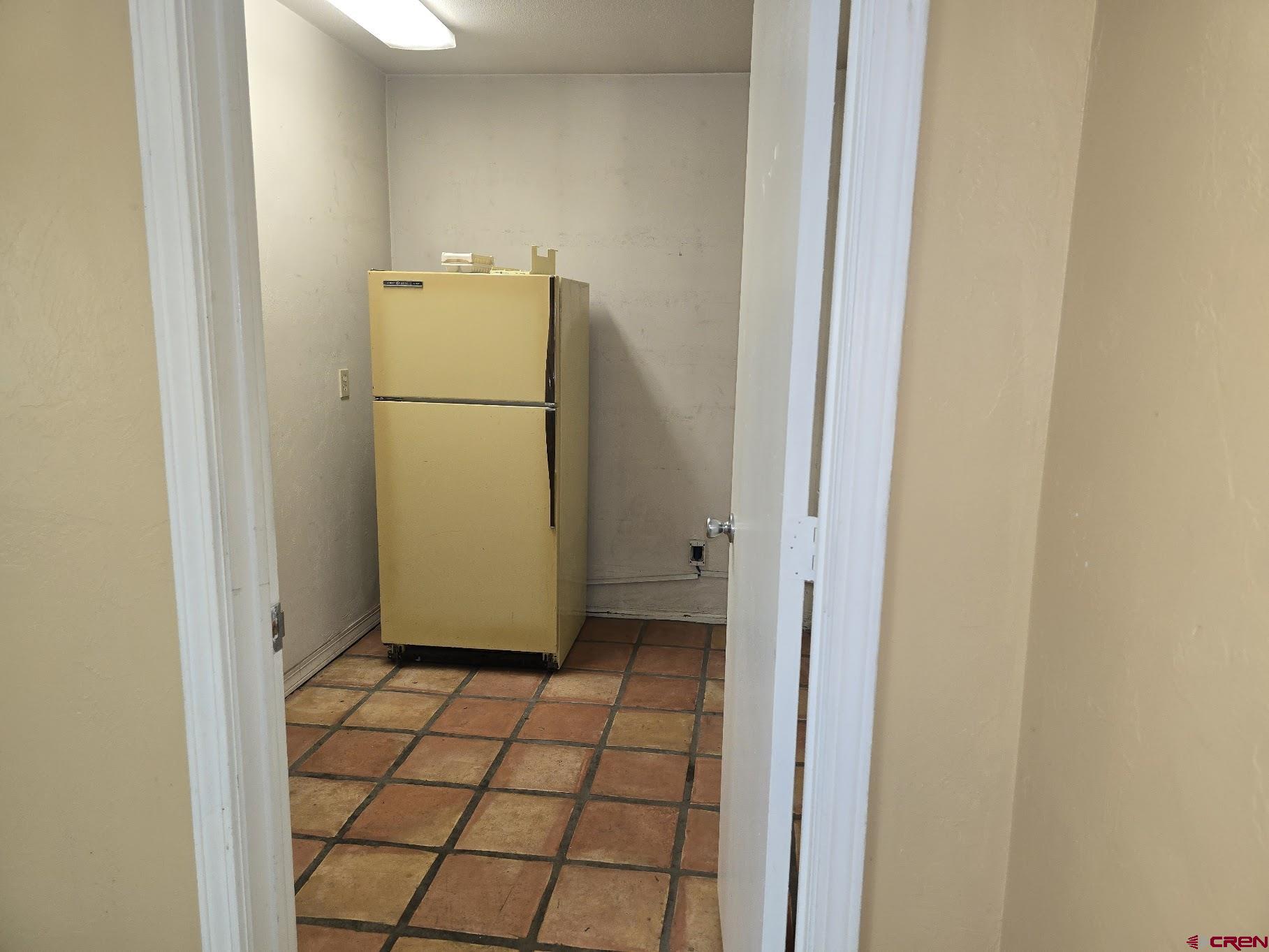 570 Turner (unit A ) Drive, Unit A Durango, CO 81303 - Photo 18 of 23 a refrigerator freezer sitting in a kitchen