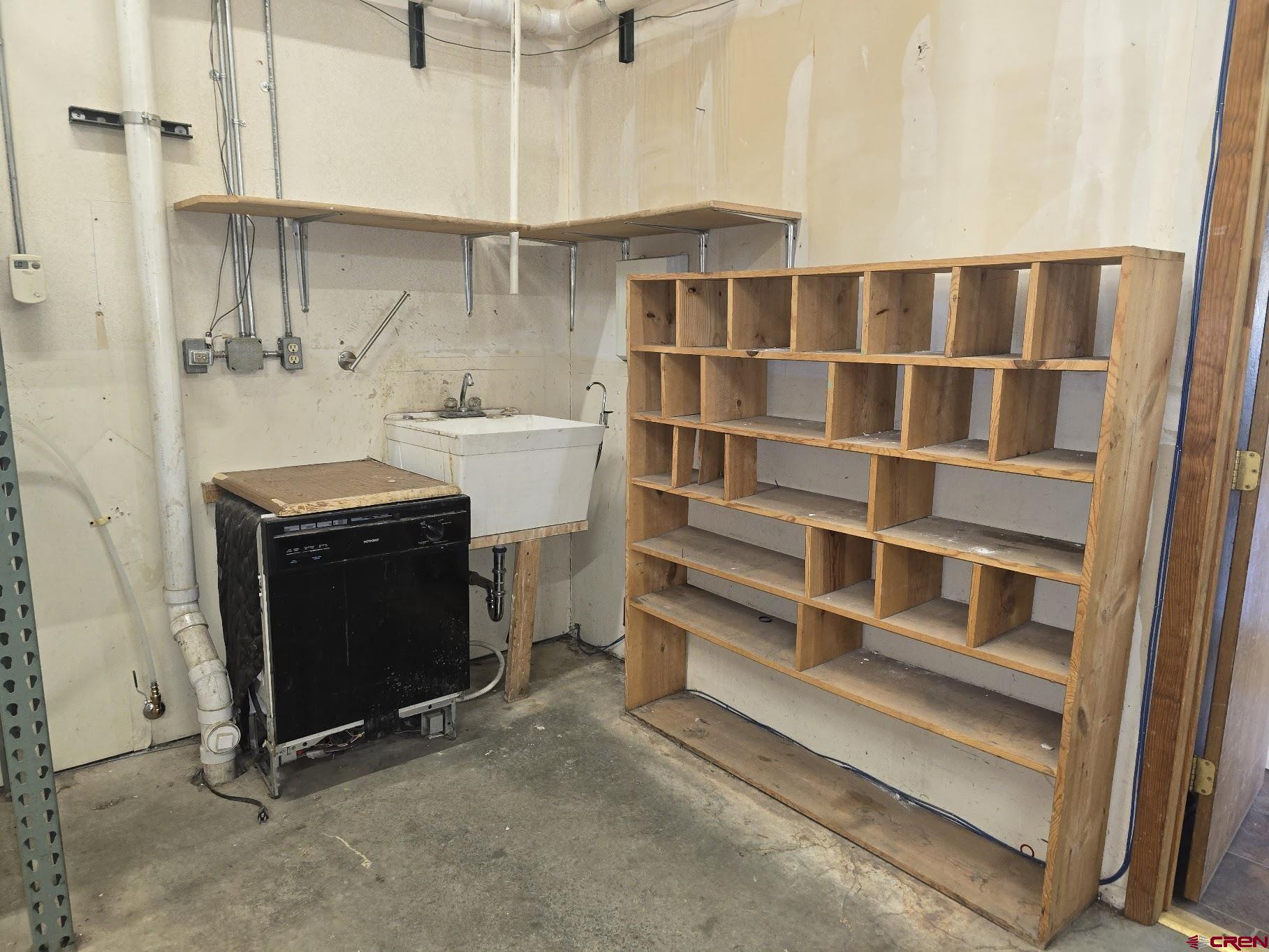 570 Turner (unit A ) Drive, Unit A Durango, CO 81303 - Photo 22 of 23 a utility room with multiple dryer and washer