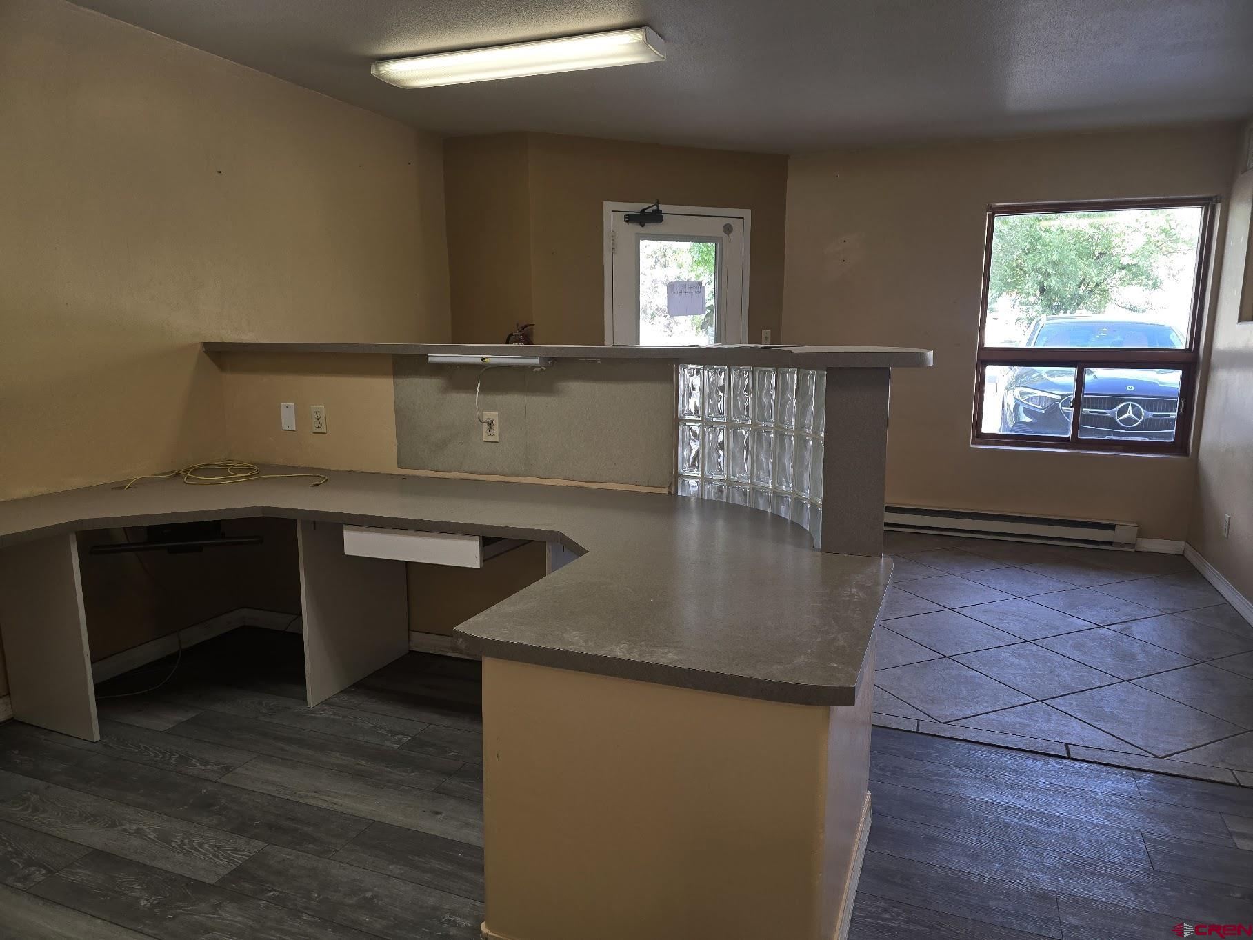 570 Turner (unit A ) Drive, Unit A Durango, CO 81303 - Photo 6 of 23 a kitchen with kitchen island a sink table and chairs