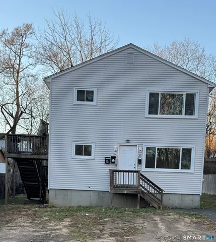 a house view with a garden space