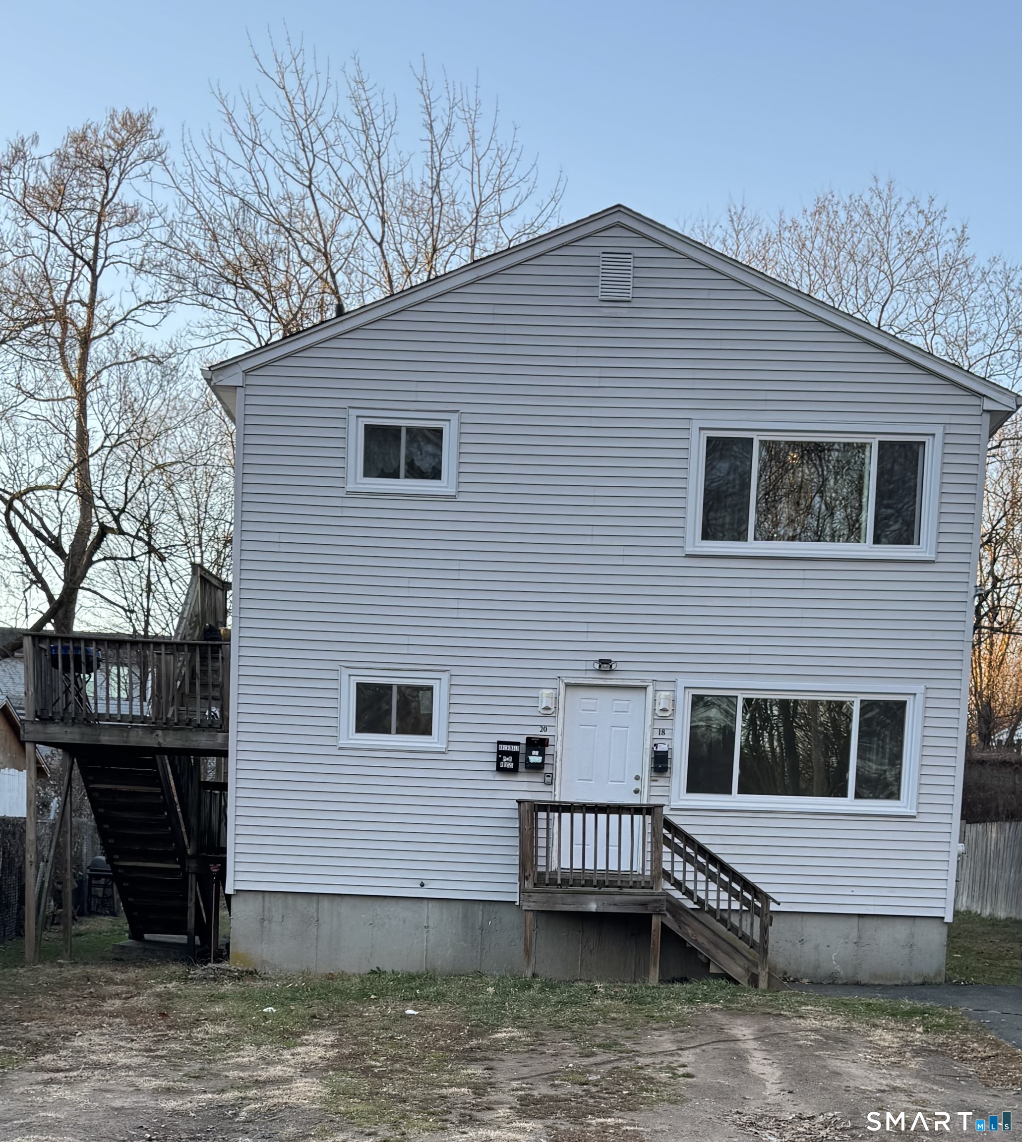 a house view with a garden space