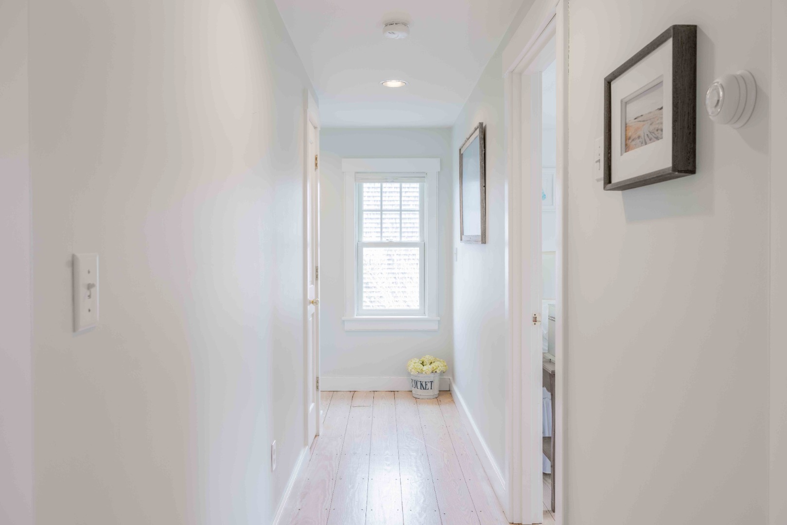 15 Goldfinch Drive Nantucket, MA 02554 - Photo 14 of 19 a view of a hallway with wooden floor and a bathroom