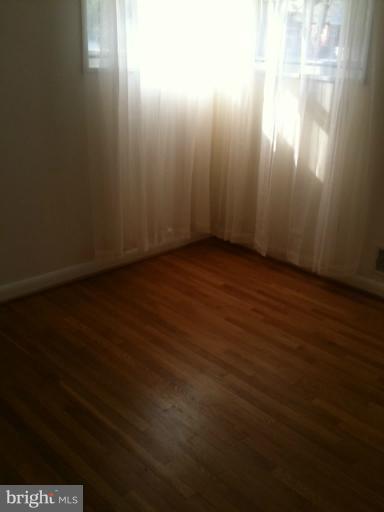 3903 Weller Road Silver Spring, MD 20906 - Photo 11 of 18 a view of wooden floor