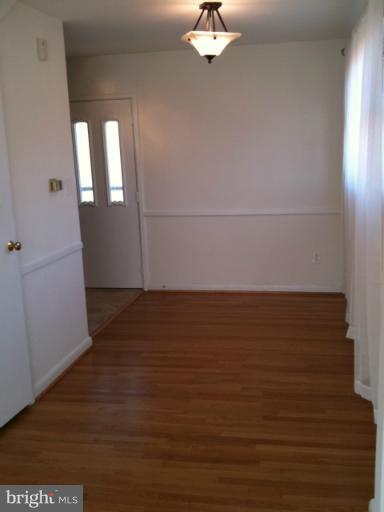 3903 Weller Road Silver Spring, MD 20906 - Photo 16 of 18 wooden floor in an empty room