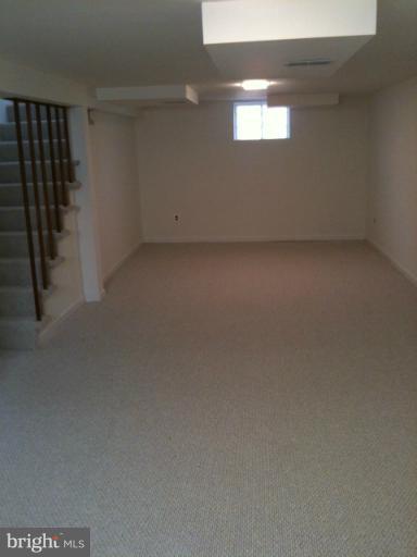 3903 Weller Road Silver Spring, MD 20906 - Photo 17 of 18 a view of an empty room and window