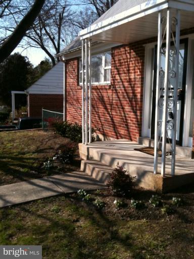 3903 Weller Road Silver Spring, MD 20906 - Photo 10 of 18 a view of a house with a yard