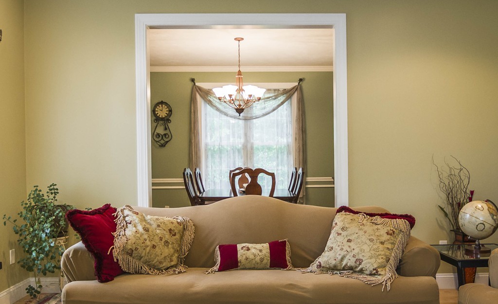 29 Tannery Road Sturbridge, MA 01518 - Photo 8 of 29 a living room with furniture and a chandelier
