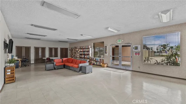 a view of a livingroom with furniture and a couch