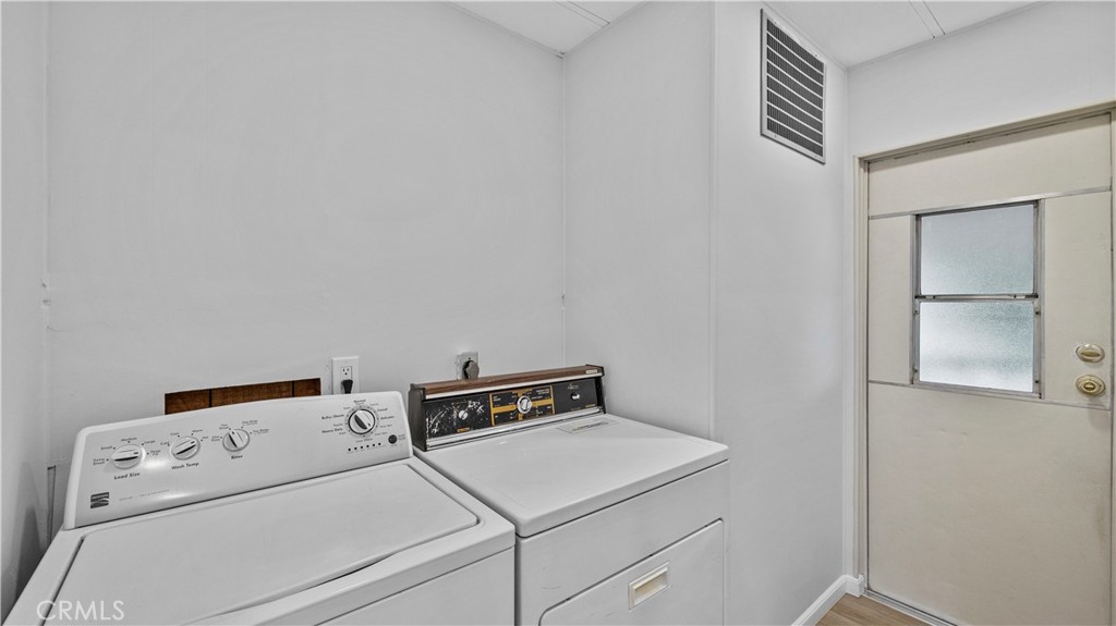 1400 13th Street, Unit 206 Upland, CA 91786 - Photo 9 of 28 a utility room with dryer and washer