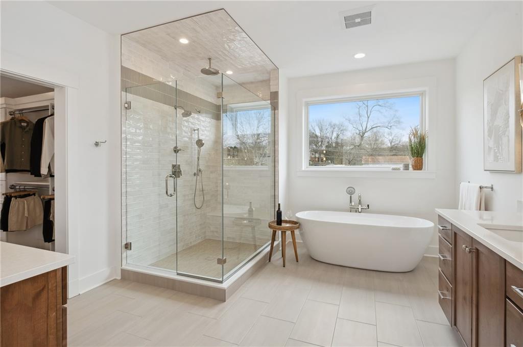 205 Rothaar Court Venetia, PA 15367 - Photo 17 of 35 a bathroom with a tub sink a shower and a mirror
