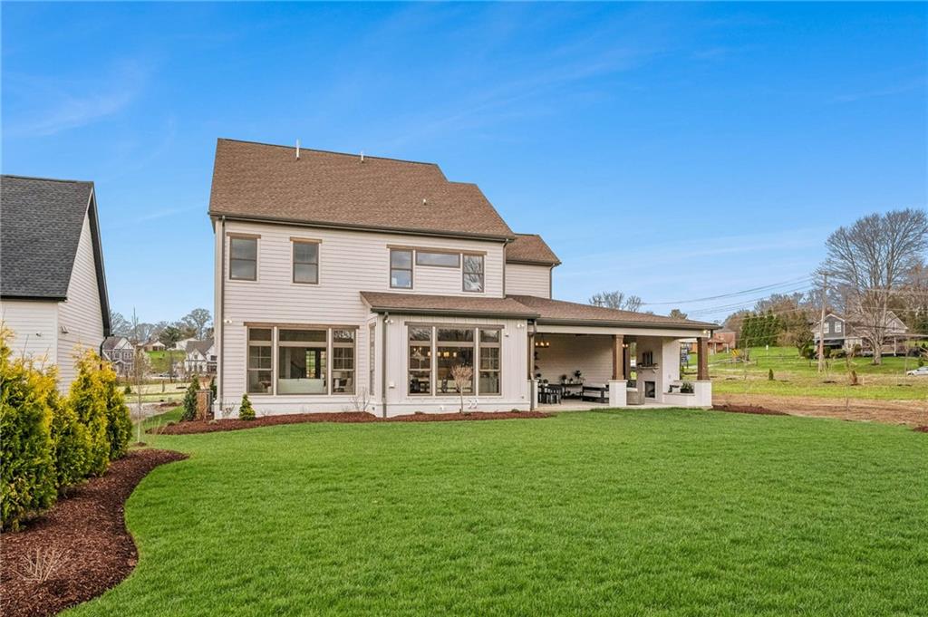 205 Rothaar Court Venetia, PA 15367 - Photo 35 of 35 a front view of a house with a garden and trees