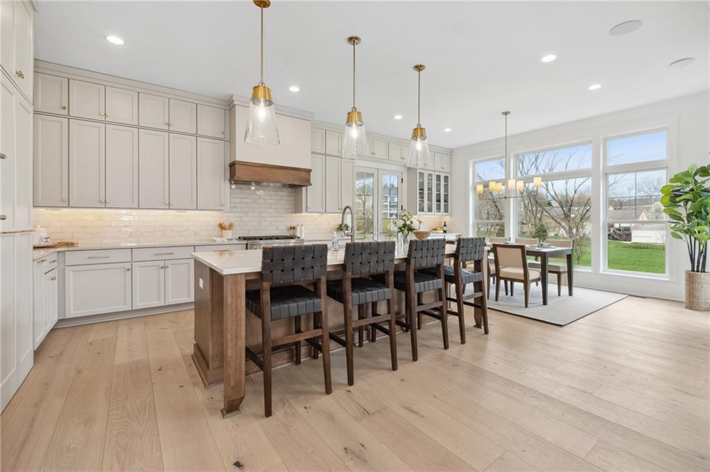 205 Rothaar Court Venetia, PA 15367 - Photo 7 of 35 a large kitchen with lots of furniture and appliances