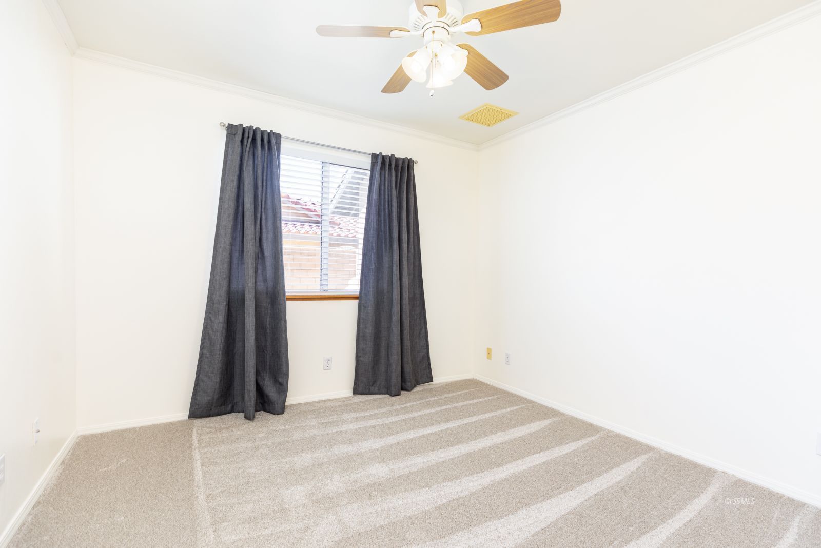 1225 Andrea Court Ridgecrest, CA 93555 - Photo 28 of 46 a view of a room with a ceiling fan