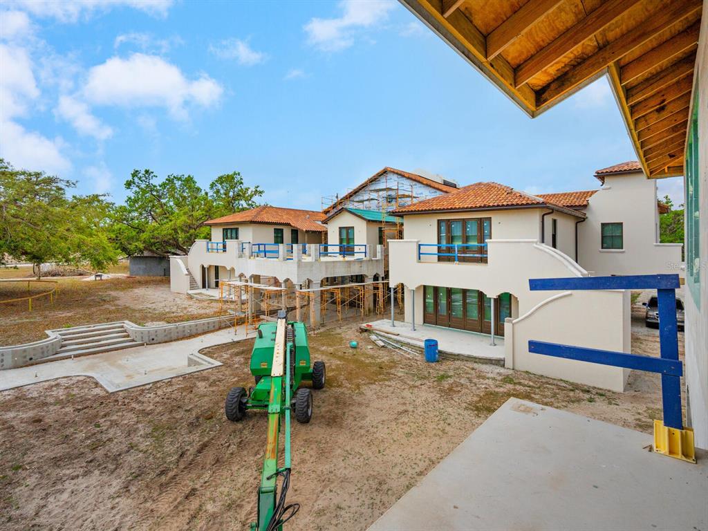 600 North Jackson Road Venice, FL 34292 - Photo 14 of 61 a front view of a house with a yard