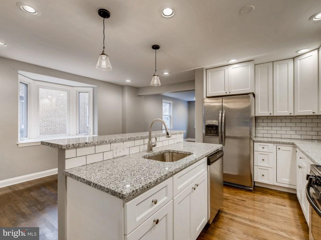 30 Mardrew Road Baltimore, MD 21229 - Photo 4 of 26 Sink & Dishwasher In Island