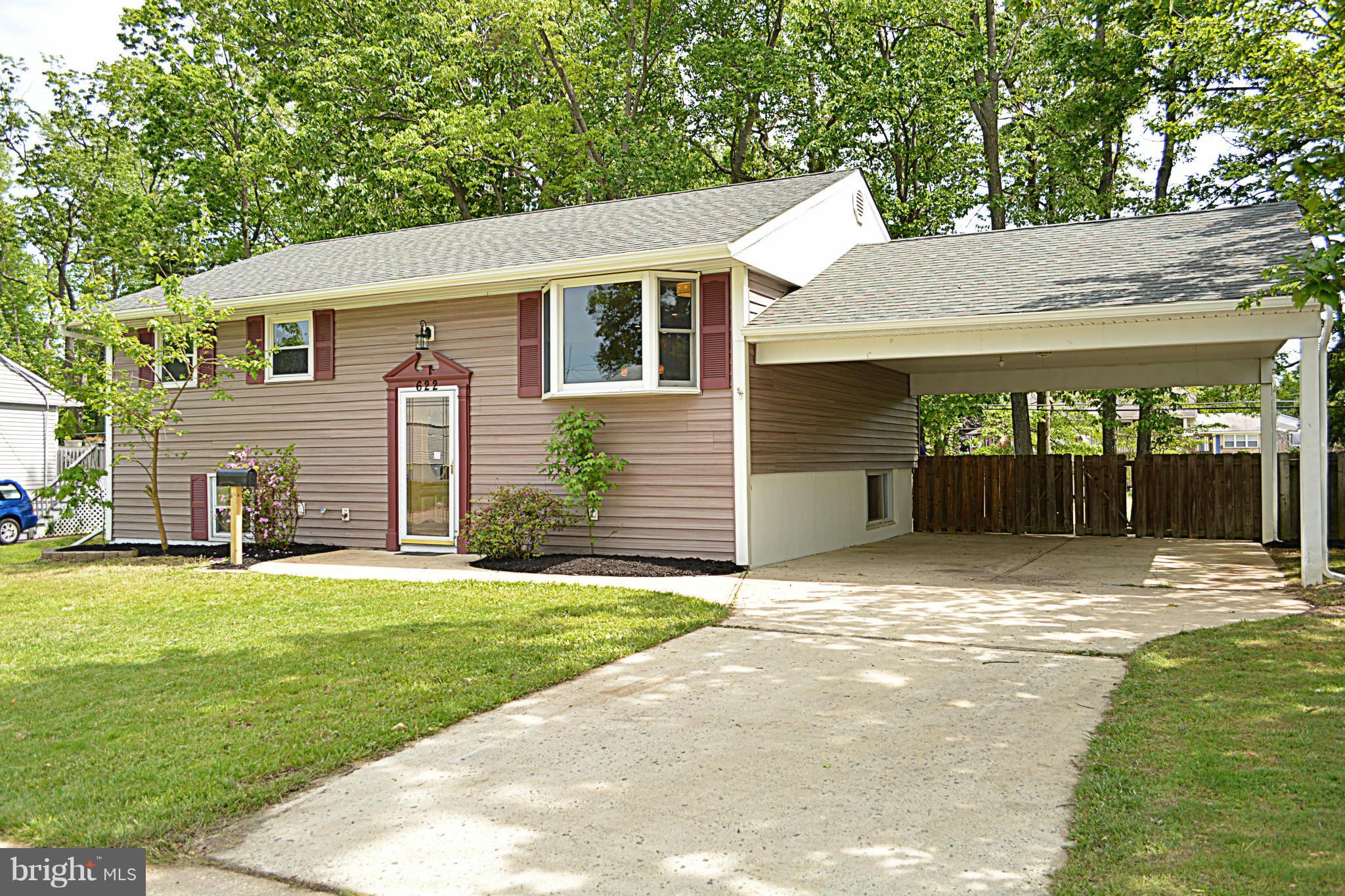 622 Hornbeam Road Edgewood, MD 21040 - Photo 2 of 19 a front view of a house with a yard and garage