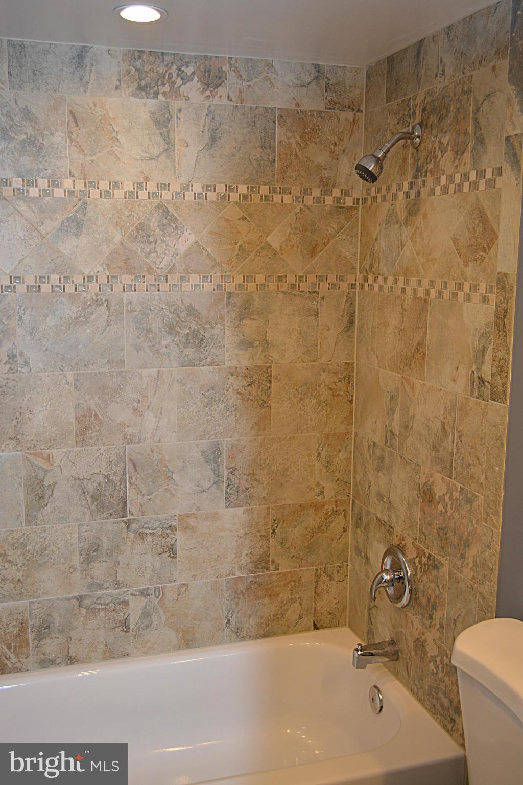 622 Hornbeam Road Edgewood, MD 21040 - Photo 16 of 19 a bathroom with a bathtub and shower