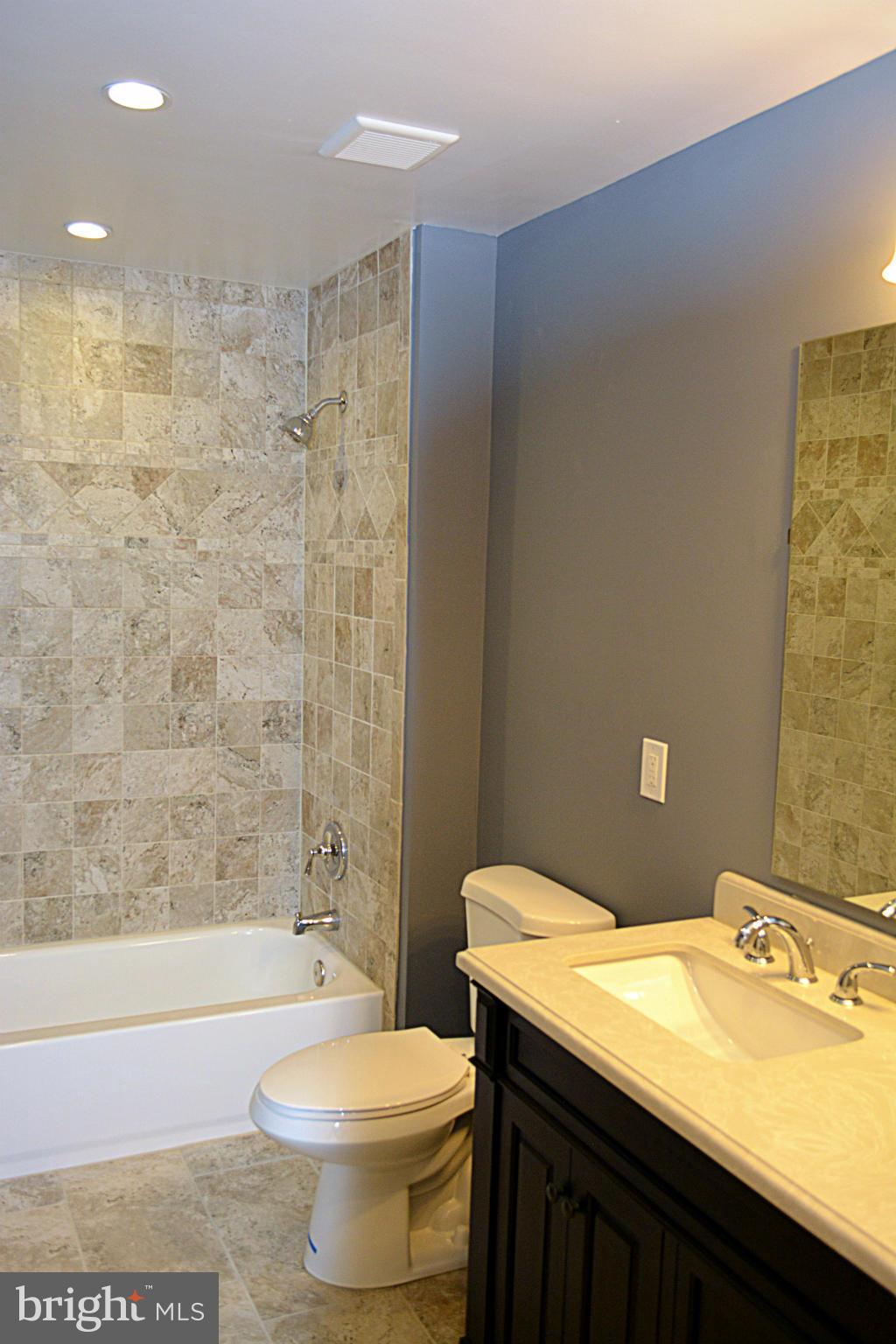 622 Hornbeam Road Edgewood, MD 21040 - Photo 10 of 19 a bathroom with a sink a toilet and shower