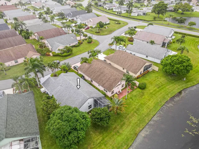 an aerial view of a house with a garden