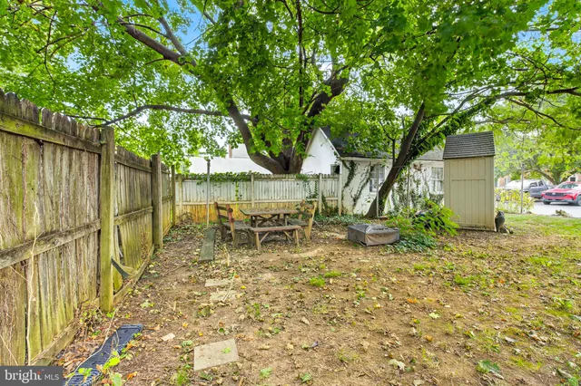 a view of a house with swimming pool and porch