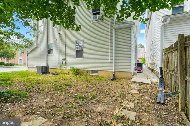 a view of an chairs in front of building