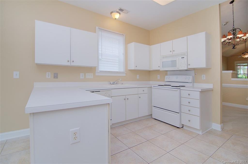 11326 Deer Ridge Lane Charlotte, NC 28277 - Photo 11 of 21 a view of a kitchen with white cabinets