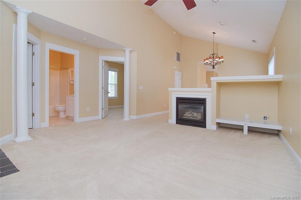 11326 Deer Ridge Lane Charlotte, NC 28277 - Photo 14 of 21 wooden floor fireplace and natural light