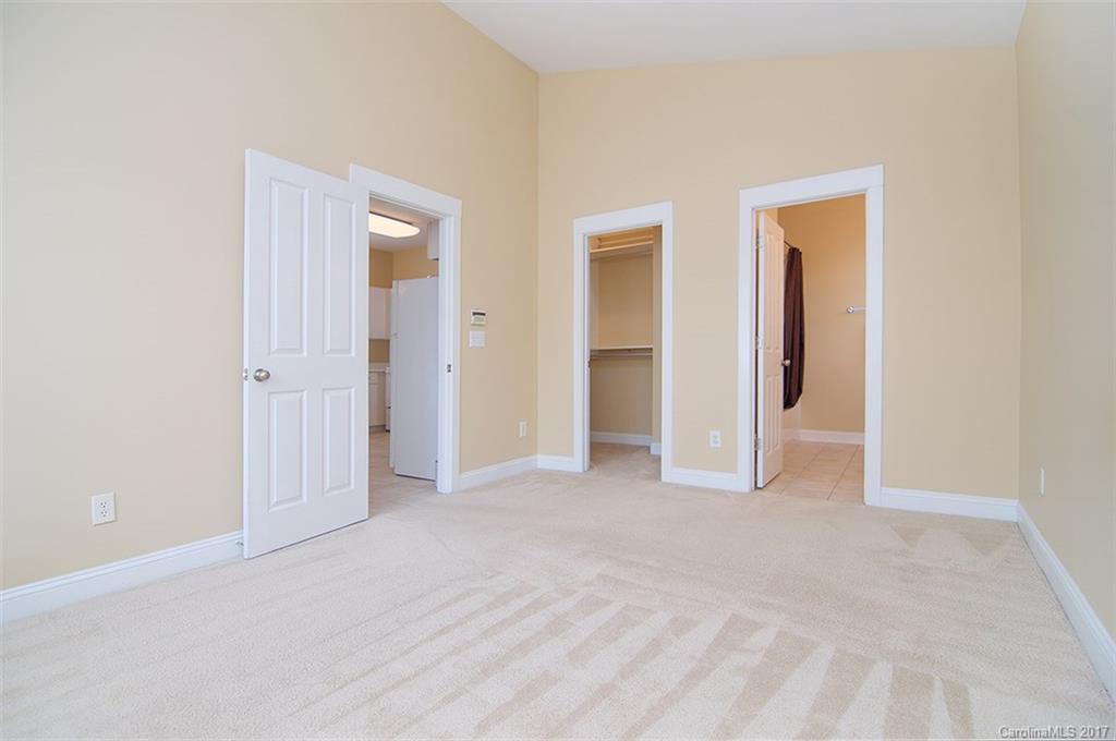11326 Deer Ridge Lane Charlotte, NC 28277 - Photo 16 of 21 an empty room with closet and a bathroom