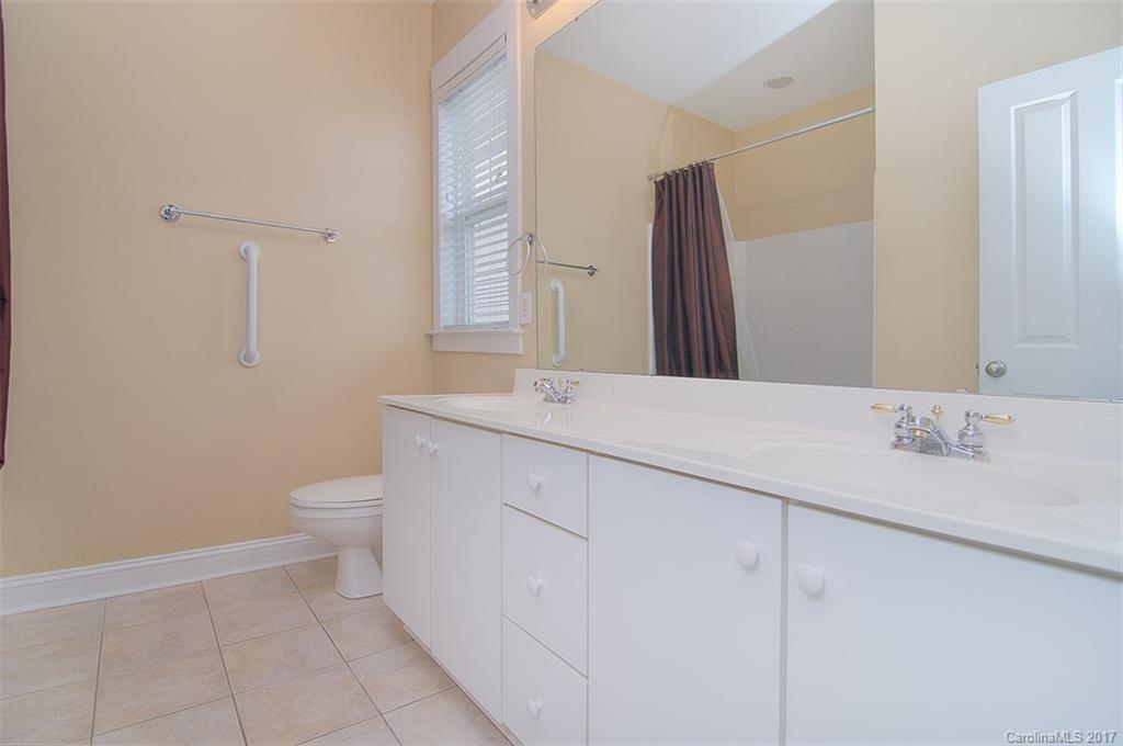 11326 Deer Ridge Lane Charlotte, NC 28277 - Photo 17 of 21 a bathroom with a sink and a mirror