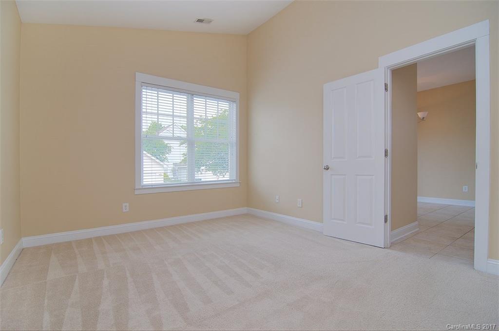 11326 Deer Ridge Lane Charlotte, NC 28277 - Photo 18 of 21 an empty room with windows