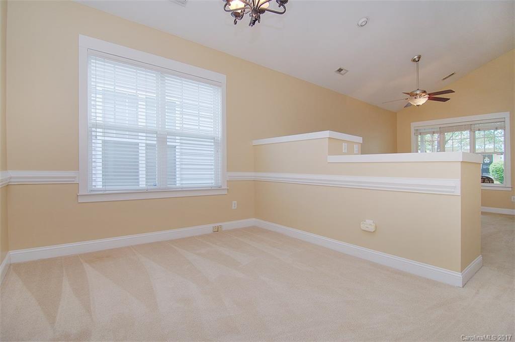 11326 Deer Ridge Lane Charlotte, NC 28277 - Photo 8 of 21 a view of an empty room with a window