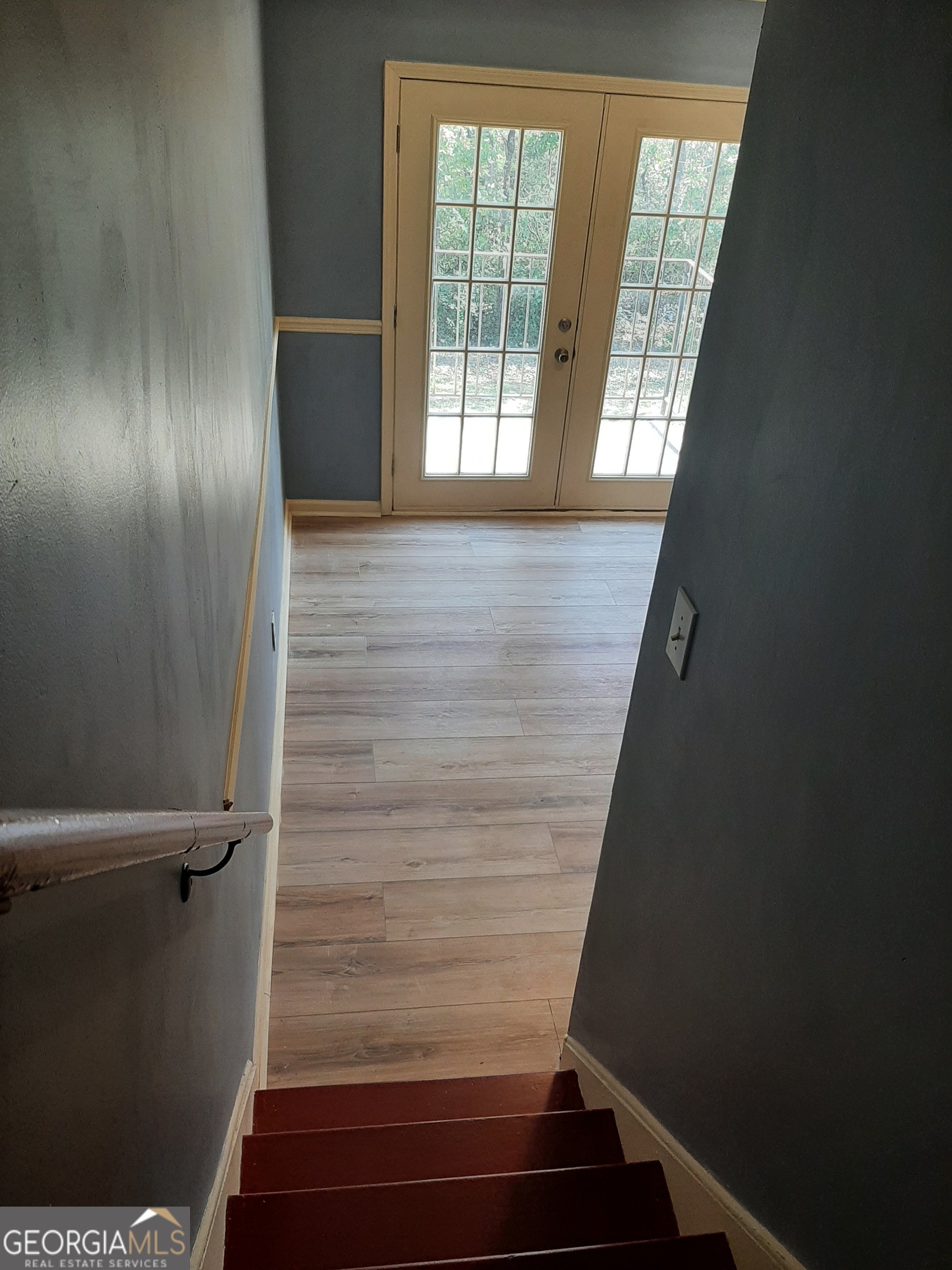 1625 Conley Road, Unit 171 Conley, GA 30288 - Photo 11 of 27 a view of entryway with wooden floor and stairs